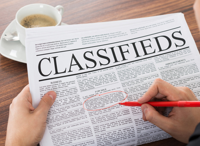 a photo of a newspaper classified page