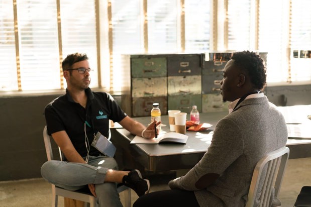 two workers sitting